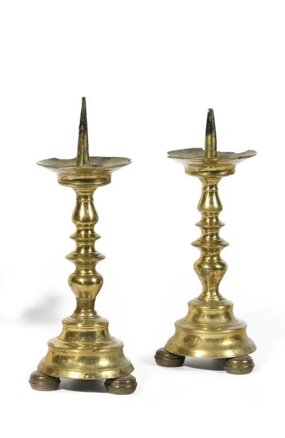 PAIR OF LARGE BRONZE CANDLESTICKS.
The baluster...