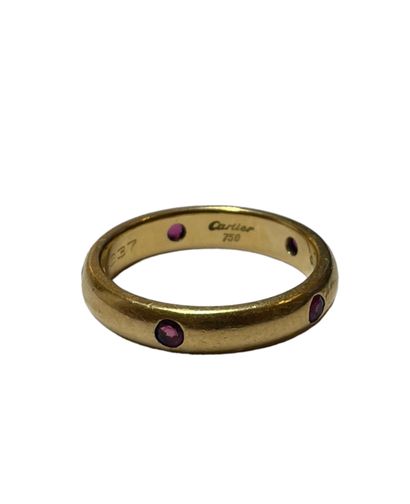 null CARTIER
Ring in 18 K yellow gold, 750 thousandths set with small rubies. Box.
Signed...