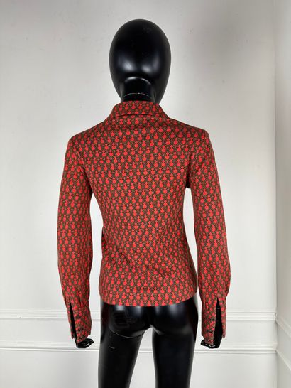 null HERMES PARIS
Veste en jersey rouge orangé à décor imprimé de fers à cheval,...