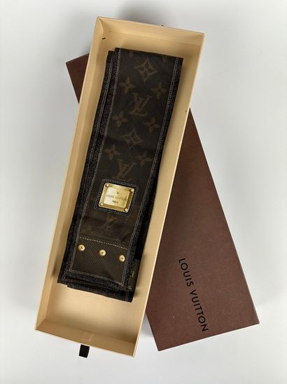 LOUIS VUITTON 
Twilly in silk with LV patterns...