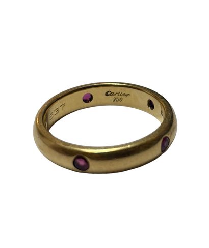 null CARTIER
Ring in 18 K yellow gold, 750 thousandths set with small rubies. Box.
Signed...