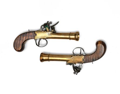 null Pair of naval flintlock pistols. 

Bronze barrels, muzzle blurred. Safety catches...