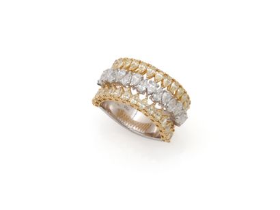 null BANDEAU RING 
holding three lines of pear-shaped diamonds (two of yellow diamonds,...