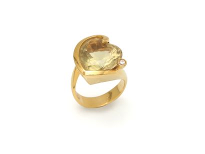 null MARCO MOLINARIO
RING 
holding a heart-shaped citrine with a round brilliant-cut...