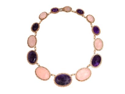 null NECKLACE
holding a succession of falling oval elements of rose quartz and amethyst....