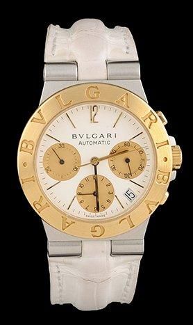 BULGARI MONTRE en or jaune et acier, le bracelet en cuir blanc d'origine, mouvement...