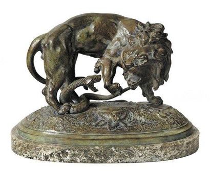 ANTOINE-LOUIS BARYE (1796-1875) Lion au serpent Épreuve en bronze patiné et signée...