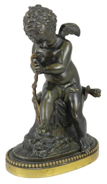 ECOLE FRANCAISE DU XIXème siècle L'Amour ailé Bronze à patine brune monté sur socle...