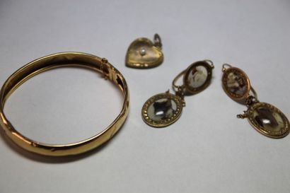 null LOT DE BIJOUX comprenant un bracelet jonc en or jaune, la monture accidentée,...
