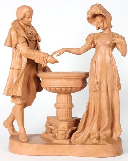 null GROUPE en terre cuite représentant un couple séparé par une fontaine, symbole...
