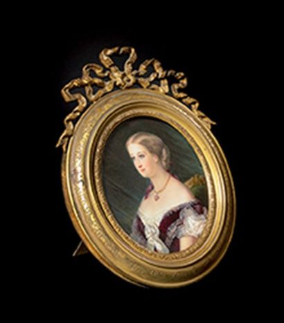 null «L'Impératrice Eugénie» en buste de profil. Grande miniature ovale sur ivoire....