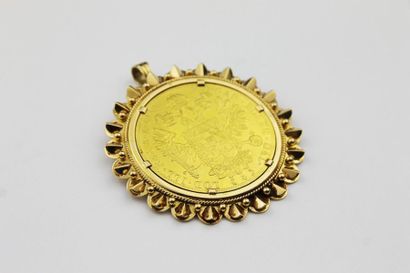 null MEDAILLON PENDENTIF en or jaune serti d'une pièce de 10 S FRANC / AUSTRIAE IMPERATOR...