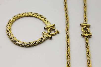 null DEMI PARURE en or jaune et or gris, composée d'un collier et d'un bracelet,...