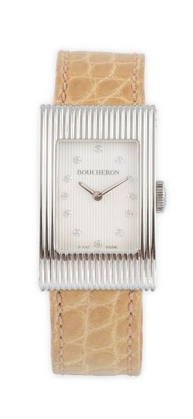 BOUCHERON MONTRE en acier, le cadran rectangulaire et godronné, modèle «Reflet»,...