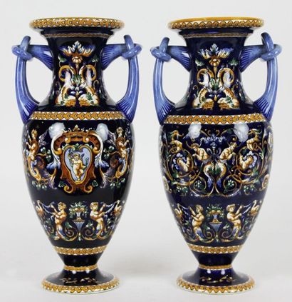 GIEN Paire de vases balustre en faience polychrome à anses ajourées stylisant des...