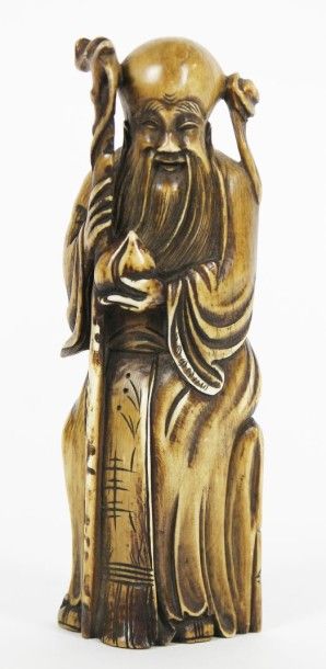 CHINE Statue Shoulao de longévité en ivoire sculpté. Signé au revers.
Haut: 18 c...