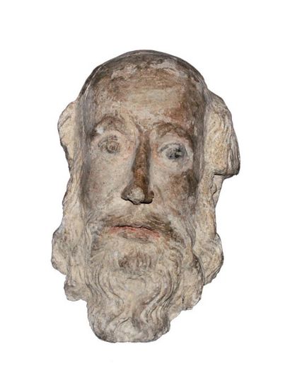 null SCULPTURE representant une Tête d'homme barbu en pierre avec rehauts de polychromie
...