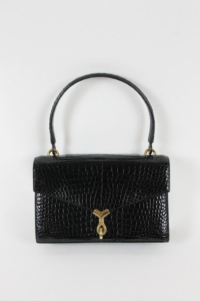 HERMÈS Paris, circa 1960 HERMES Paris, circa 1960

SAC en croco noir. Garniture en...