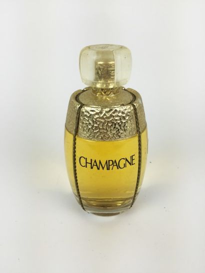 Yves Saint LAURENT DEUX FLACONS - FACTICES de parfum "Champagne". H : 13 et 9,5 cm....