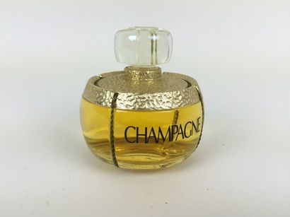 Yves Saint LAURENT DEUX FLACONS - FACTICES de parfum "Champagne". H : 13 et 9,5 cm....