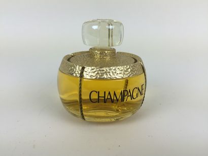 Yves Saint LAURENT DEUX FLACONS - FACTICES de parfum "Champagne". H : 13 et 7,5 cm....