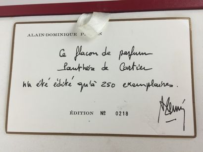 CARTIER, 1987 Grand COFFRET en cuir rouge contenant un FLACON GEANT en cristal de...