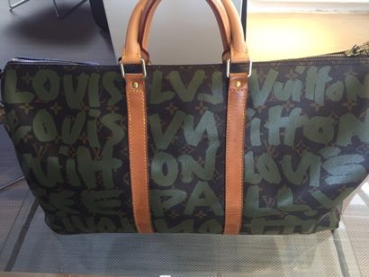 LOUIS VUITTON SAC "Keepall Graffiti" par Stephan Sprouse. Edition limitée. En toile...