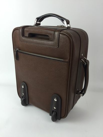 PRADA Petite VALISE CABINE en cuir caramel. Fermeture éclair, deux anses en cuir,...