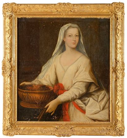 null ECOLE FRANCAISE du XVIIIème siècle Portrait de femme tenant dans ses mains un...