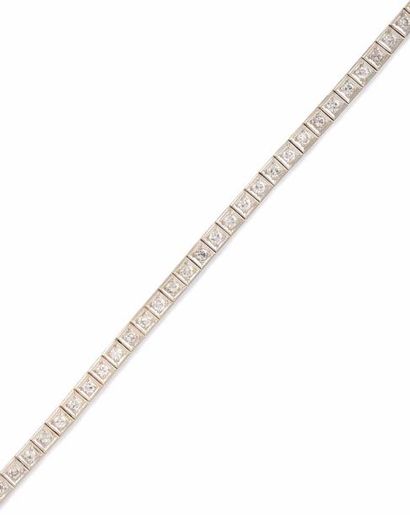 null BRACELET LIGNE en or gris retenant une succession de diamants de taille brillant...