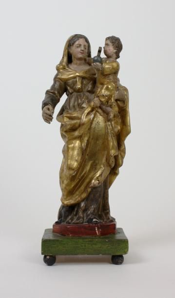 null VIERGE A L'ENFANT en bois doré et polychromé. XVIIIème siècle Haut : 37 cm (éclats...