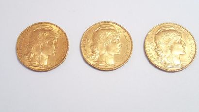 null 
3 pièce de 20 Francs en or jaune datées 1912 et 1913 au profil de la république...