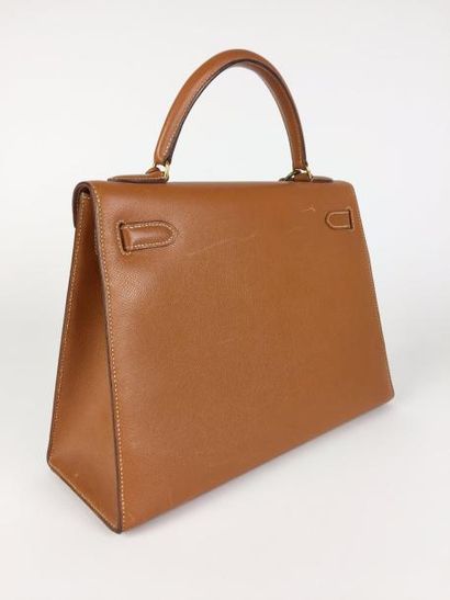 null HERMES Paris Made in France, 1990 SAC Kelly 32 cm finition sellier en veau courchevel...