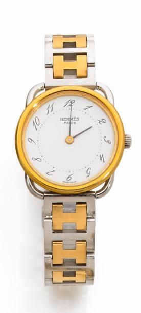 null HERMÈS MONTRE DE DAME, LE MODÈLE ARCEAU petit modèle en acier et or jaune, boitier...