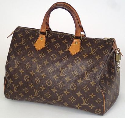 null VUITTON Sac "Speedy" en toile Monogram et cuir naturel, garnitures en laiton...