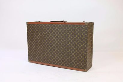 null VUITTON Grande Valise rigide "Alzer" à compartiment intérieur en toile Monogram,...