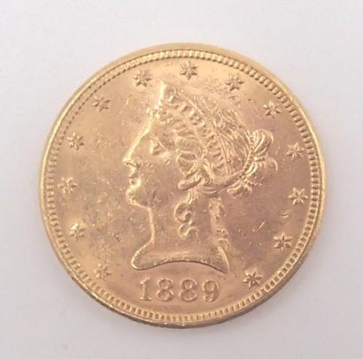 null PIECE de 10 dollars US type Liberté datée de 1889. Poids : 18 g A yellow gold...