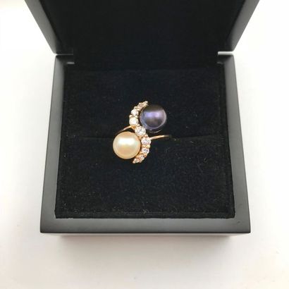 null A yellow gold, diamond and pearl ring.