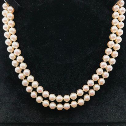 null A cultured pearl and white gold necklace.