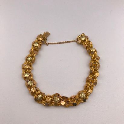 null A yellow and pink gold bracelet.