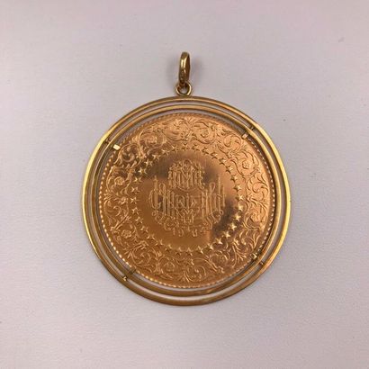 null A yellow gold medal pendant.