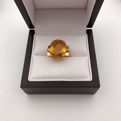 null A citrine and yellow gold ring.