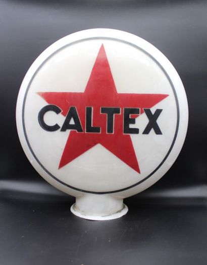null "Globe Opaline - CALTEX"

Globe en opaline de forme ronde pour la marque "CALTEX",...