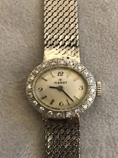 null TISSOT

Montre bracelet de dame en or blanc 18k. 

Boîtier ovale, lunette sertie...