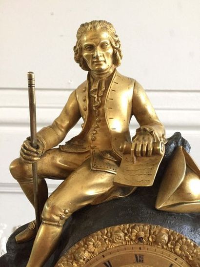 null PENDULE en bonze doré et tôle représentant Jean-Jacques Rousseau assis sur un...