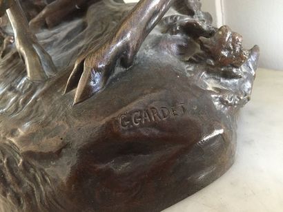 null Georges GARDET (1863-1939) Combat de cerfs Bronze à patine brune Signé sur la...