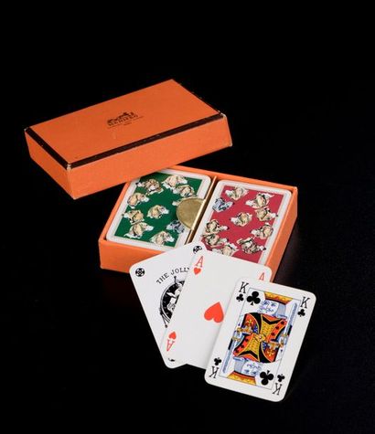 null HERMÈS

Mini set de deux jeux de cartes à jouer, la tranche dorée, le dos figurant...