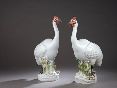 null In the taste of MEISSEN.
Pair of white porcelain guinea fowls standing on leafy...