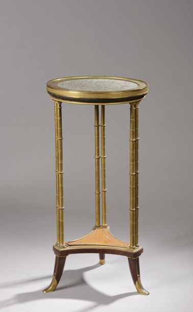 null Tripod pedestal table in mahogany, mahogany veneer and amboina burr, the uprights...
