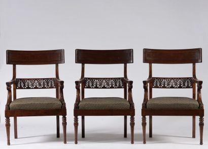 null A suite of six armchairs with moulded and carved mahogany veneer and entablature...